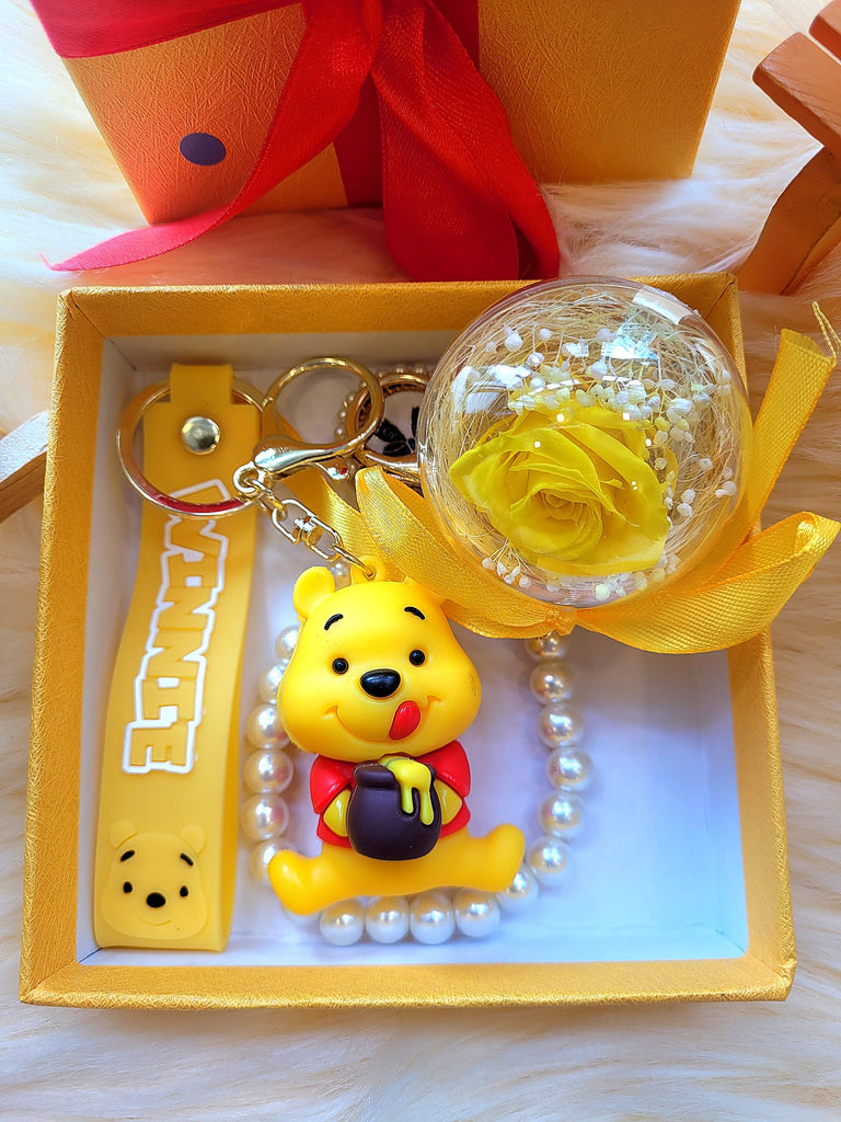 Yellow Rose Preserved Flower Charm With Winnie The Pooh. Same Day Delivery Available.
