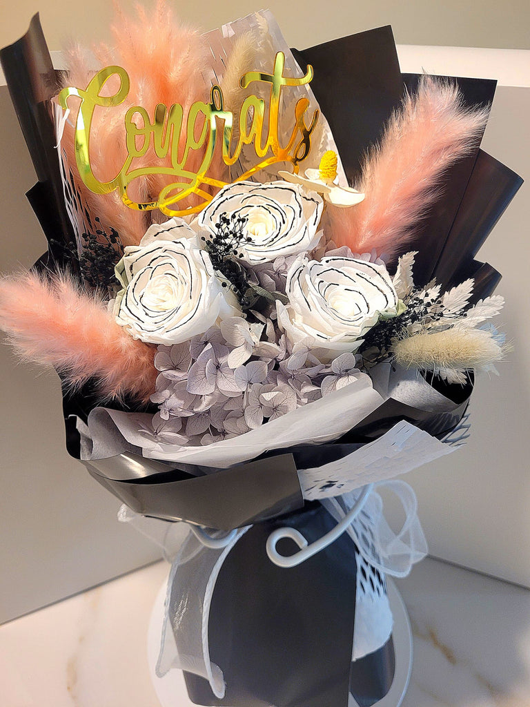 Congrats! Timeless Romance Chanel White Preserved Roses Bouquet.