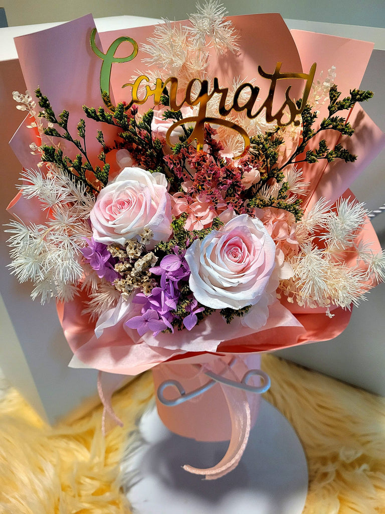 Congrats! Multi-Pink Preserved Roses Bouquet. Same Day Delivery.