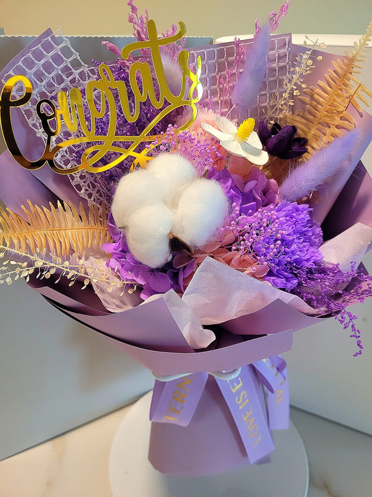 Congrats! Eternal Blossoms Preserved Purple Carnation Bouquet.