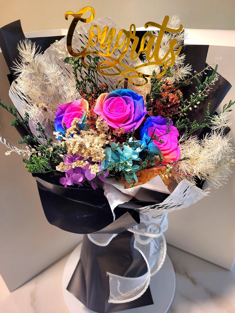 Congrats! Rainbow Preserved Roses Bouquet With Classy Black Wrapper.
