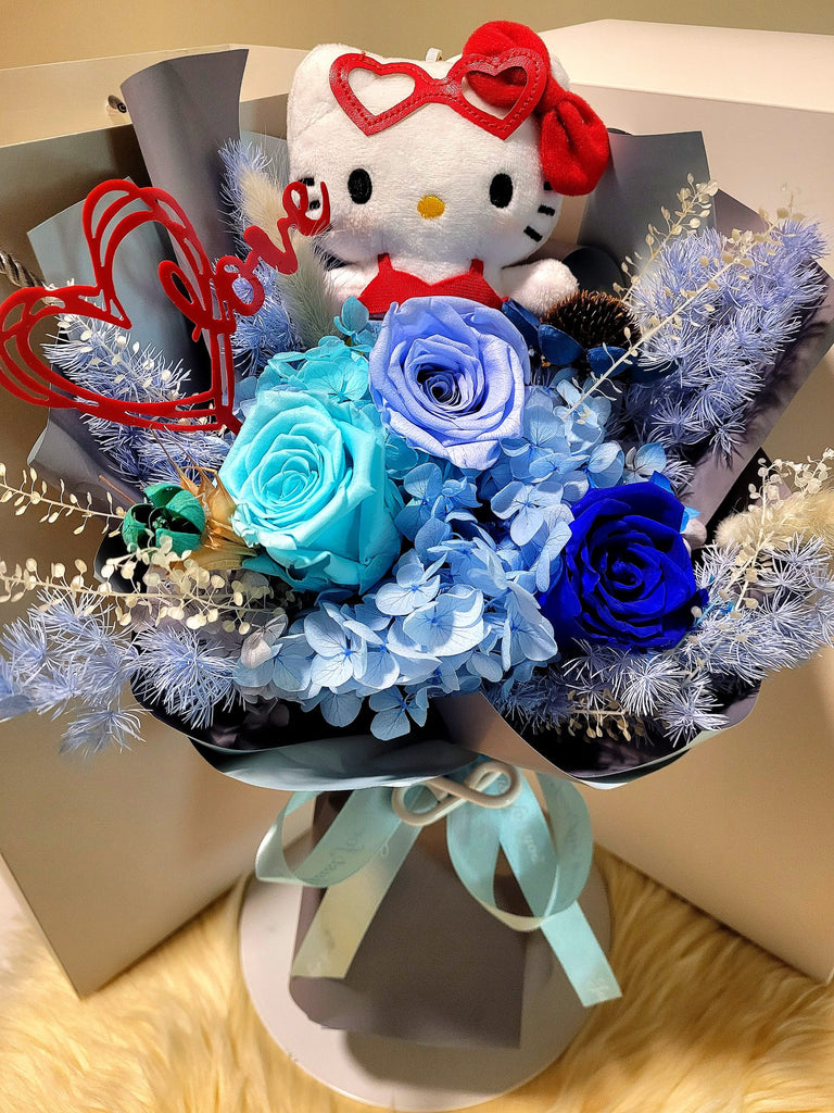 Eternal Elegance Blue Preserved Roses Bouquet With Hello Kitty Plush Toy. Same Day Delivery.