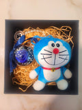 Dark Blue Rose Preserved Flower Charm With Doraemon Plush. Same Day Delivery Available.