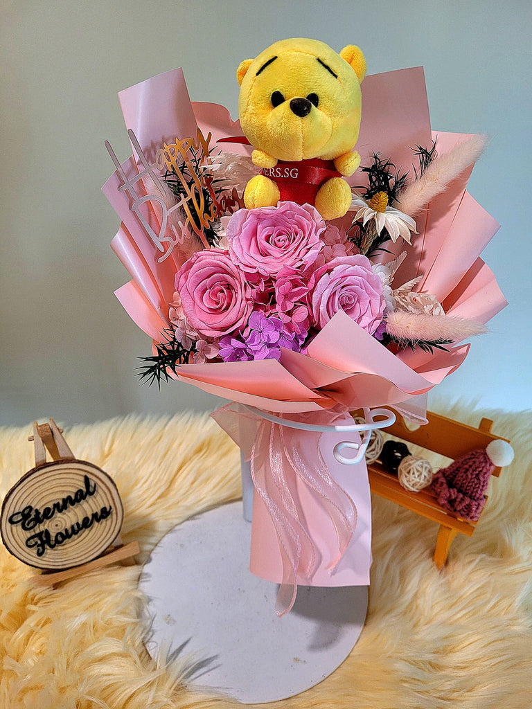 Forever In Love Preserved Flowers Bouquet With Winnie The Pooh Plush Toy. 100% High Quality Real Flowers. Same Day Delivery.