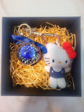 Dark Blue Rose Preserved Flower Charm With Hello Kitty Plush. Same Day Delivery Available.