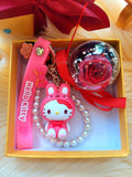 Red Rose Preserved Flower Charm With Hello Kitty. Same Day Delivery Available.