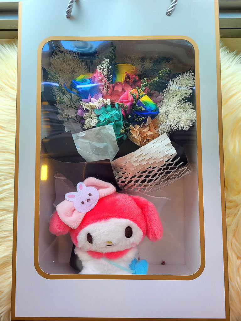 Rainbow Preserved Roses Bouquet With Classy Black Wrapper And My Melody Plush Toy. 100% High Quality Real Flowers. Same Day Delivery.