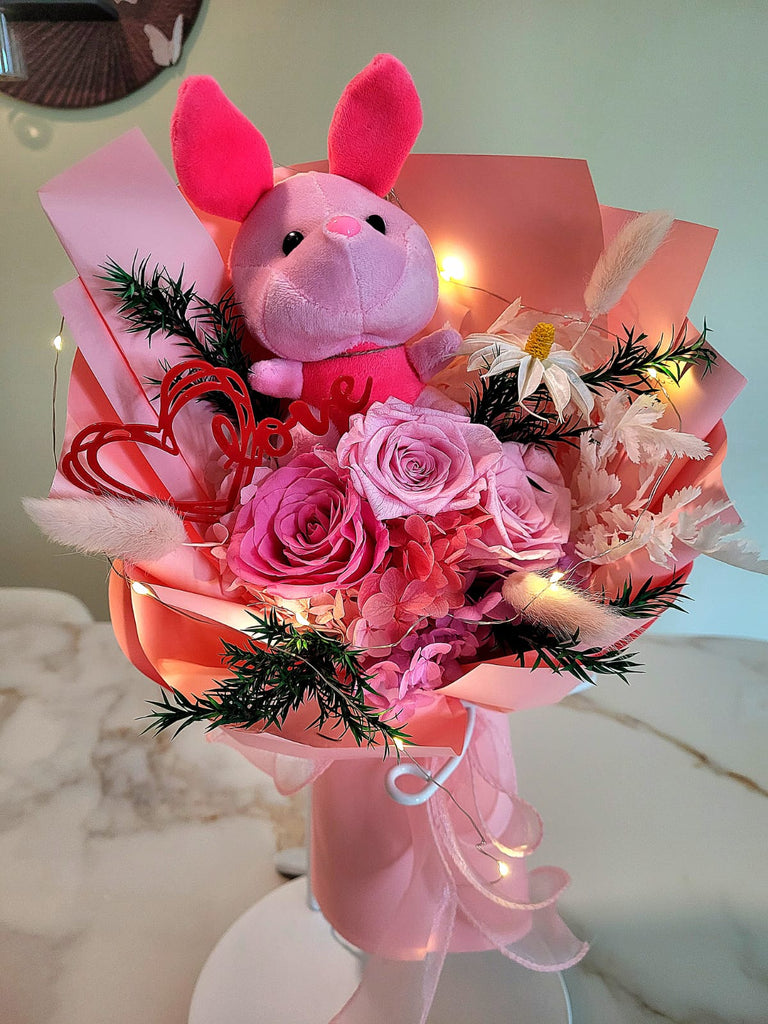 Forever In Love Preserved Flowers Bouquet With Piglet Plush Toy. 100% High Quality Real Flowers. Same Day Delivery.