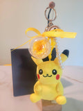 Yellow Rose Preserved Flower Charm With Pikachu Plush. Same Day Delivery Available.