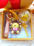 Yellow Rose Preserved Flower Charm With Pompompurin. Same Day Delivery Available.