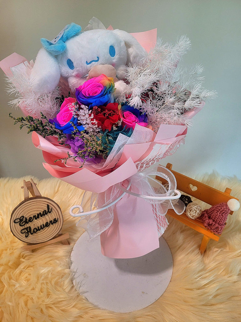 Rainbow Preserved Roses Bouquet With Elegant Pink Wrapper and Cinnamoroll Plush Toy. Same Day Delivery.