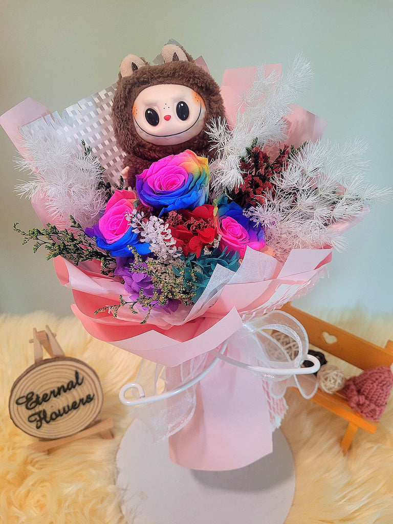 Rainbow Preserved Roses Bouquet With Elegant Pink Wrapper and Labubu Plush Toy. Same Day Delivery.