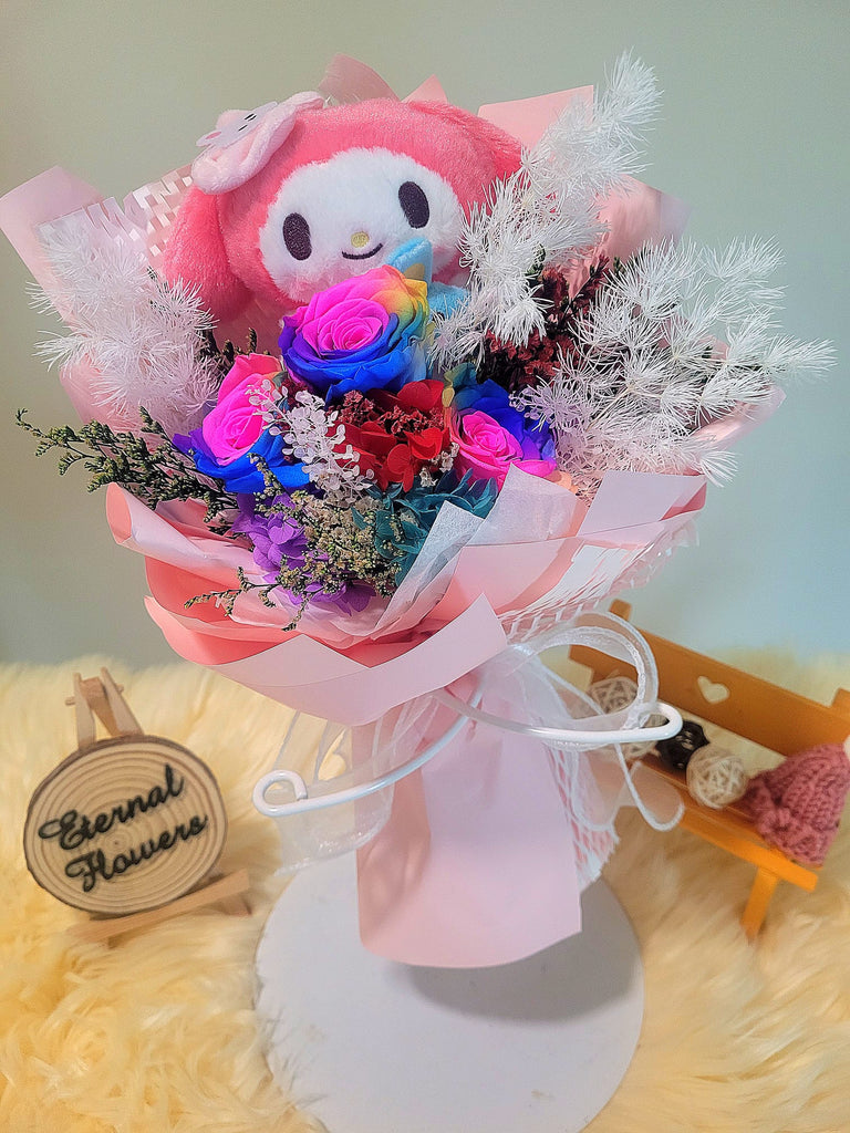 Rainbow Preserved Roses Bouquet With Elegant Pink Wrapper and My Melody Plush Toy. Same Day Delivery.