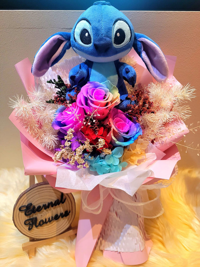 Rainbow Preserved Roses Bouquet With Elegant Pink Wrapper With Stitch