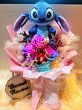 Rainbow Preserved Roses Bouquet With Elegant Pink Wrapper With Stitch