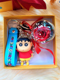 Red Rose Preserved Flower Charm With Special Edition Crayon Shin-Chan. Same Day Delivery Available.