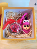 Red Rose Preserved Flower Charm With Special Edition Crayon Shin-Chan. Same Day Delivery Available.