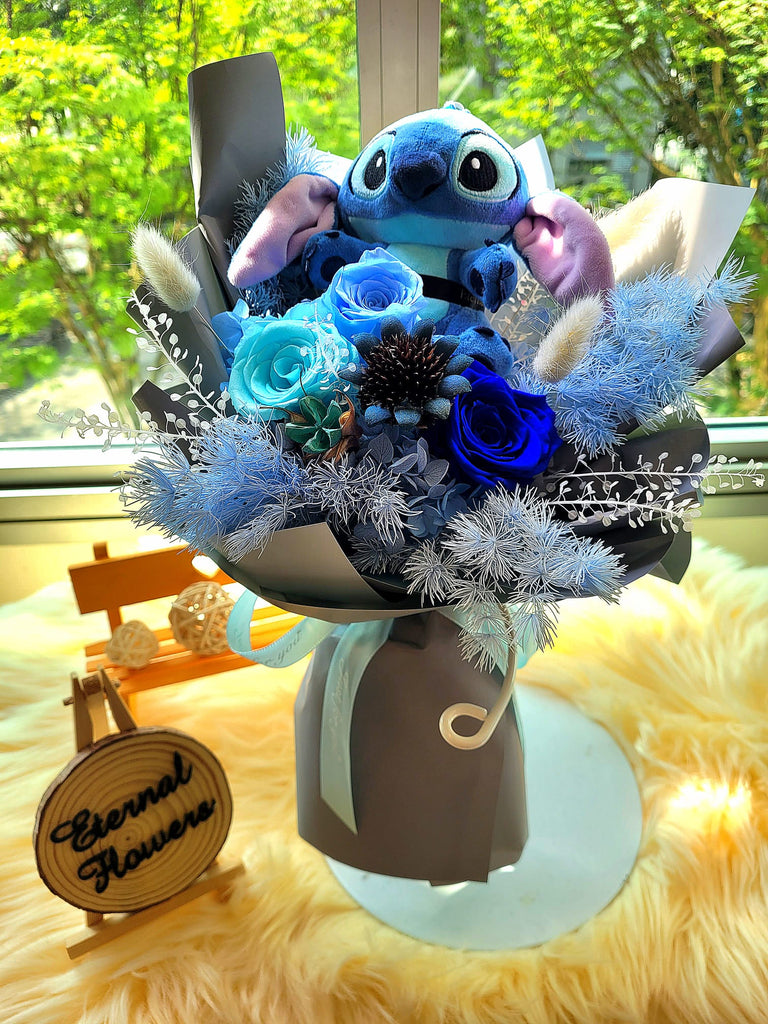 Eternal Elegance Blue Preserved Roses Bouquet With Stitch Plush Toy. Same Day Delivery. Eternal Elegance Blue Preserved Roses Bouquet With Stitch Plush Toy. Same Day Delivery.