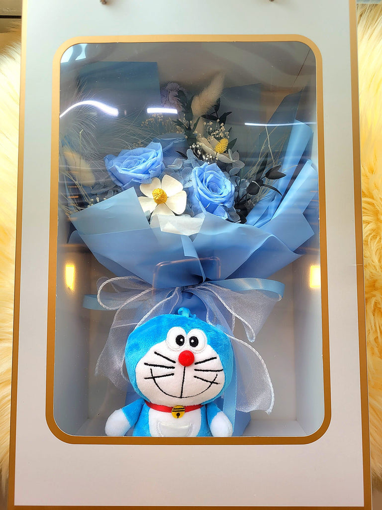 Timeless Romance Blue Preserved Roses Bouquet With Doraemon Plush Toy. Same Day Delivery.