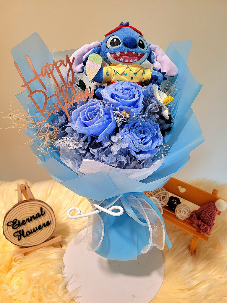 Timeless Romance Blue Preserved Roses Bouquet With Stitch Plush Toy. Same Day Delivery.