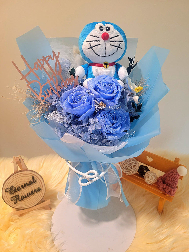 Timeless Romance Blue Preserved Roses Bouquet With Doraemon Plush Toy. Same Day Delivery.