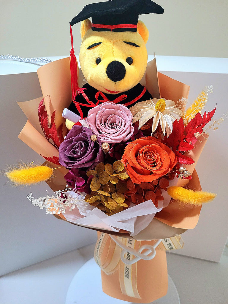 Graduation Bouquet: Dark Orange, Smoke And Light Pink Preserved Roses With Winnie The Pooh