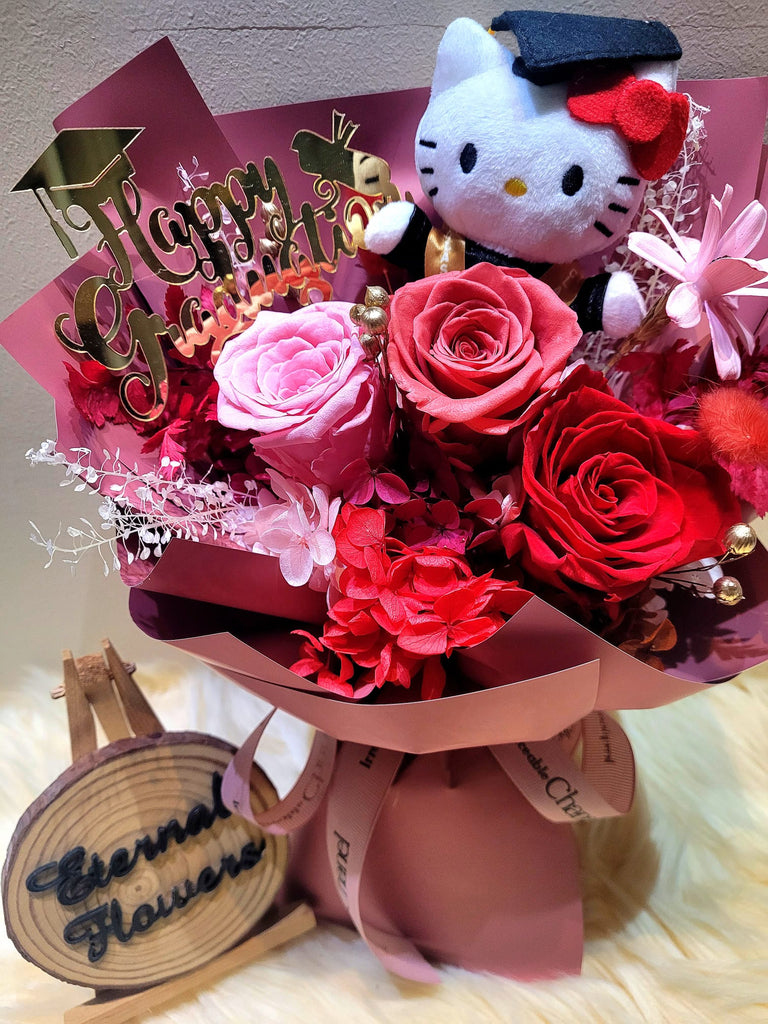Graduation Bouquet With Mini Hello Kitty Plush And Red Pink Preserved Roses (Happy Graduation Stick Included)