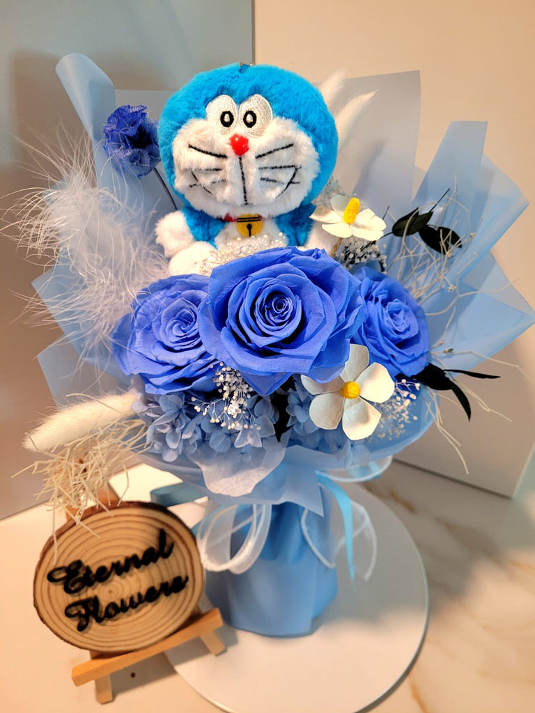 Timeless Romance Blue Preserved Roses Bouquet With Doraemon Plush Toy. Same Day Delivery.