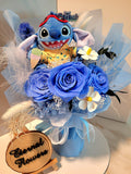 Timeless Romance Blue Preserved Roses Bouquet With Stitch Plush Toy. Same Day Delivery.