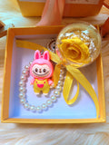 Yellow Rose Preserved Flower Charm With Labubu. Same Day Delivery Available.